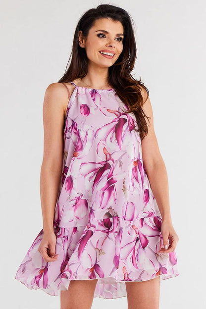 Elegant chiffon daydress by Awama featuring a delicate ruffled hem and adjustable straps, perfect for summer outings.