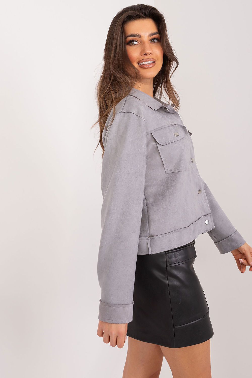 Versatile Badu Women's Lightweight Polyester Jacket with a sleek profile, featuring a luxurious look and long sleeves for added comfort in cooler evenings.