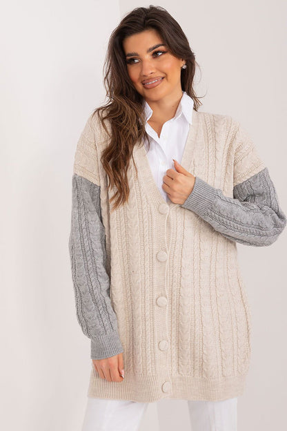 Badu's fashionable long sleeve cardigan displayed in a casual setting, demonstrating its versatility for both work and leisure.