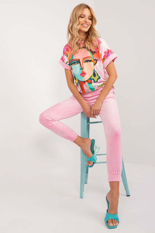 Comfortable pants from the Luxurious Velour Set by Rue Paris, designed with a high drawstring waistband and side slip pockets for a casual yet stylish look.