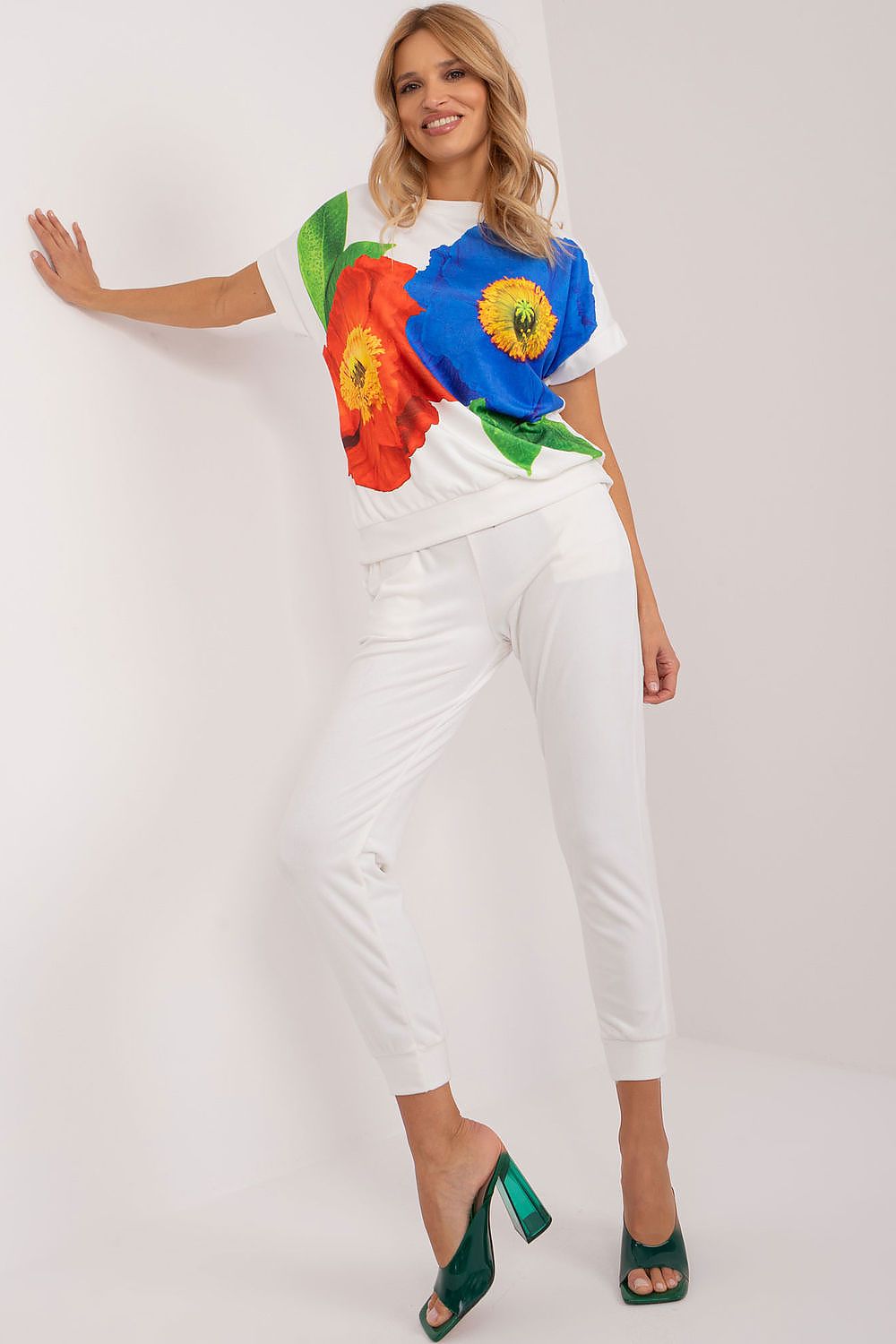 Back view of the Rue Paris velour set showcasing the elegant blouse and stylish long pants, perfect for a casual yet luxurious look.