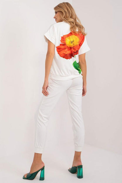 Close-up of the drawstring waistband of Rue Paris velour pants, demonstrating its adjustable fit and chic side slip pockets.