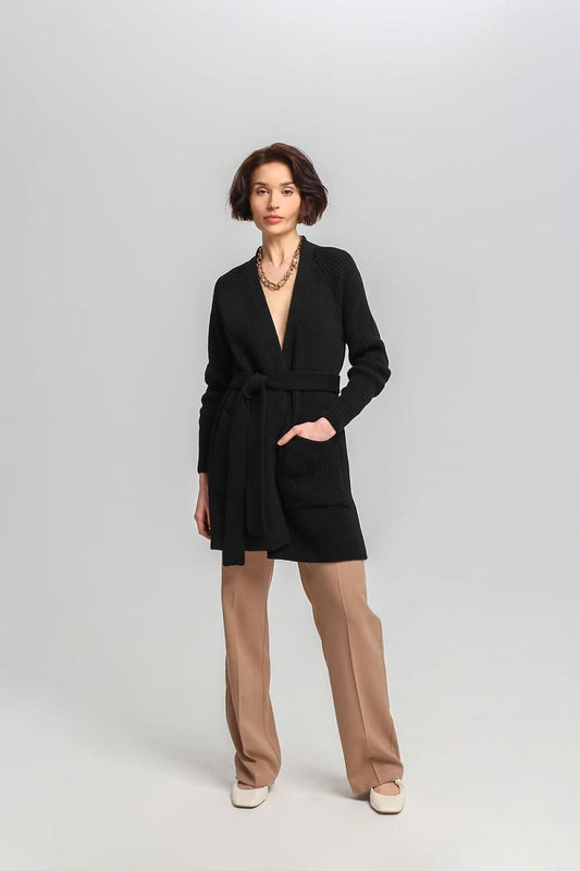 Luxurious MKM long cardigan featuring a ribbed weave, tie belt, and pockets, crafted in a warm acrylic and wool blend, perfect for sophisticated layering.