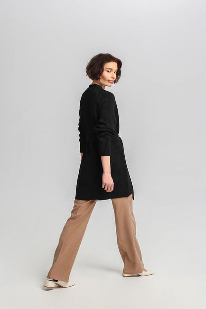 Elegant MKM cardigan with long sleeves and a flattering silhouette, designed in a cozy acrylic and wool blend, ideal for stylish winter wear.