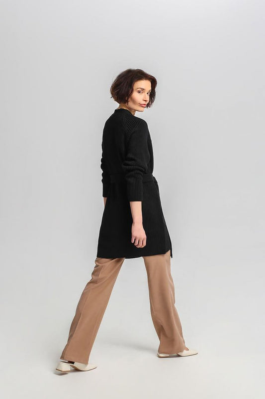 Elegant MKM cardigan with long sleeves and a flattering silhouette, designed in a cozy acrylic and wool blend, ideal for stylish winter wear.