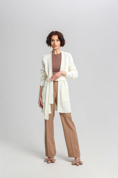 Luxurious long MKM cardigan in a rich acrylic and wool blend, featuring elegant pockets and a stylish tie belt, perfect for cozy elegance.