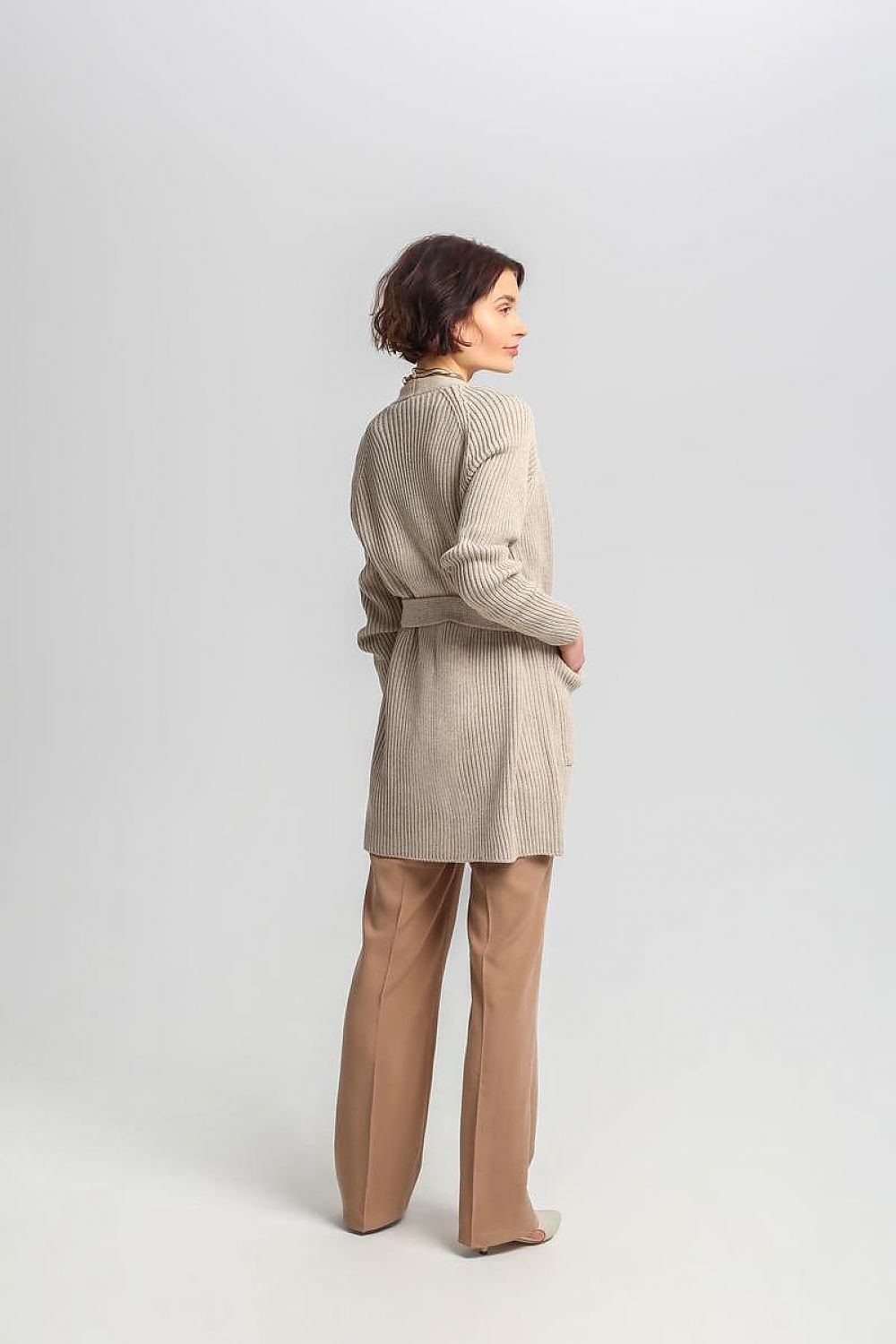 Luxurious MKM long cardigan featuring pockets and a tie belt, crafted from a warm acrylic and wool blend.