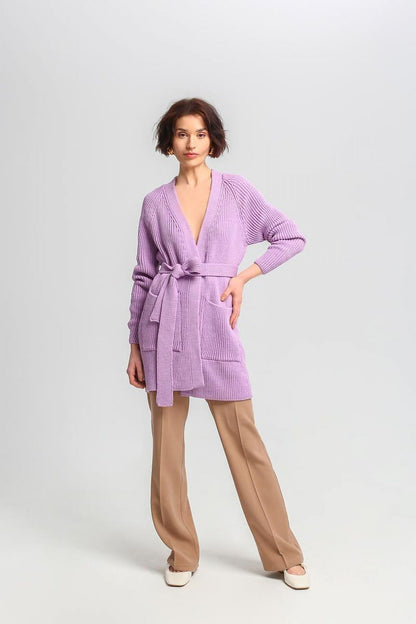 Elegant MKM long cardigan displayed with long sleeves and ribbed weave, perfect for chilly weather.