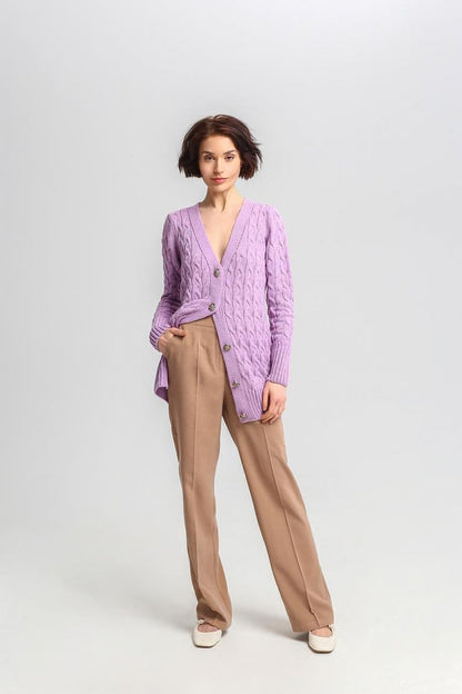 Luxurious MKM long cardigan with distinctive crest buttons, perfect for a chic appearance.