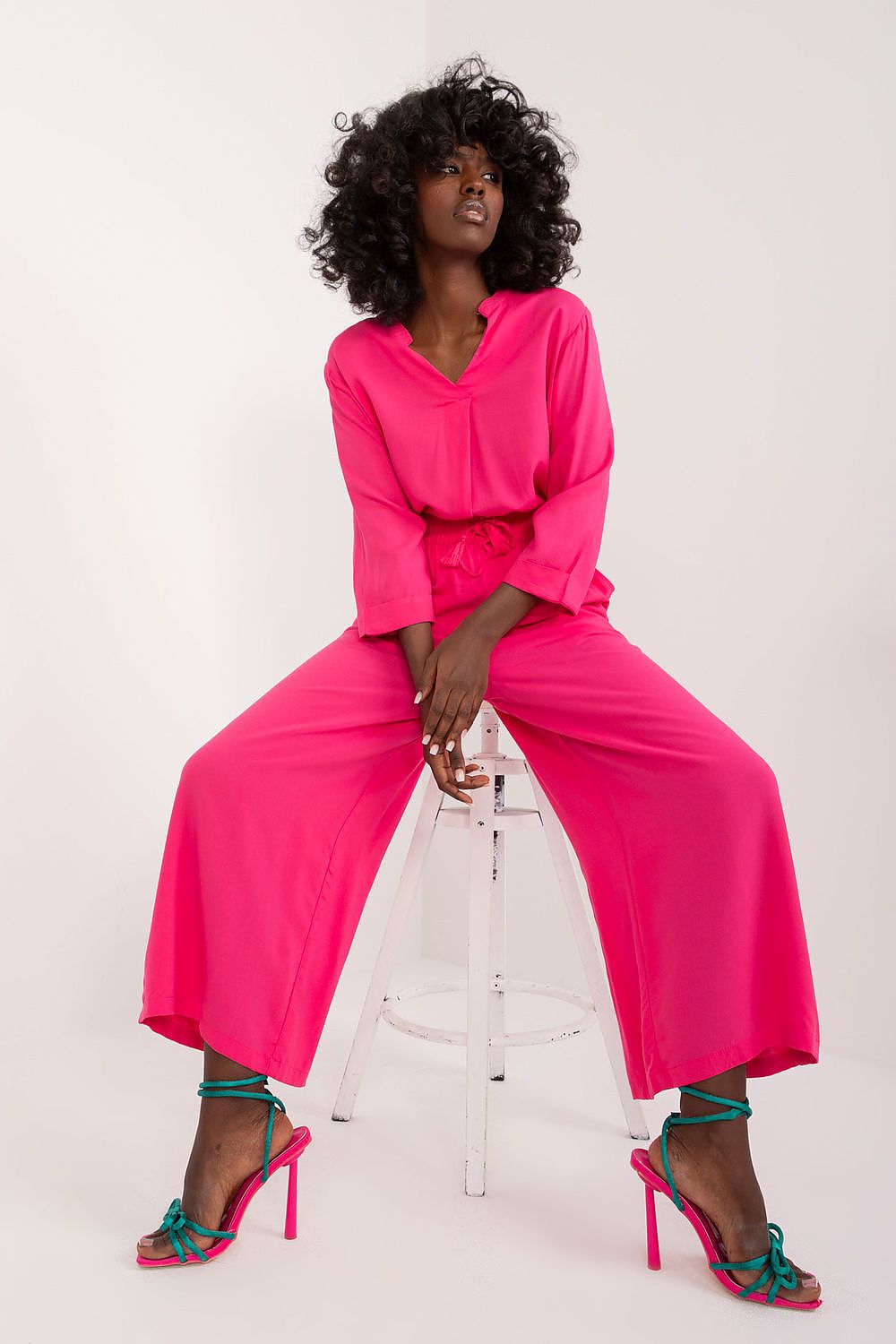 Elegant women's palazzo pants by Sublevel, made from soft viscose for a luxurious look and comfortable fit, featuring high rise and practical pockets.