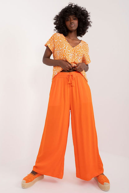 High-quality Sublevel palazzo pants for women in soft viscose, showcasing a stylish high rise design with wide legs and slip pockets for functionality.