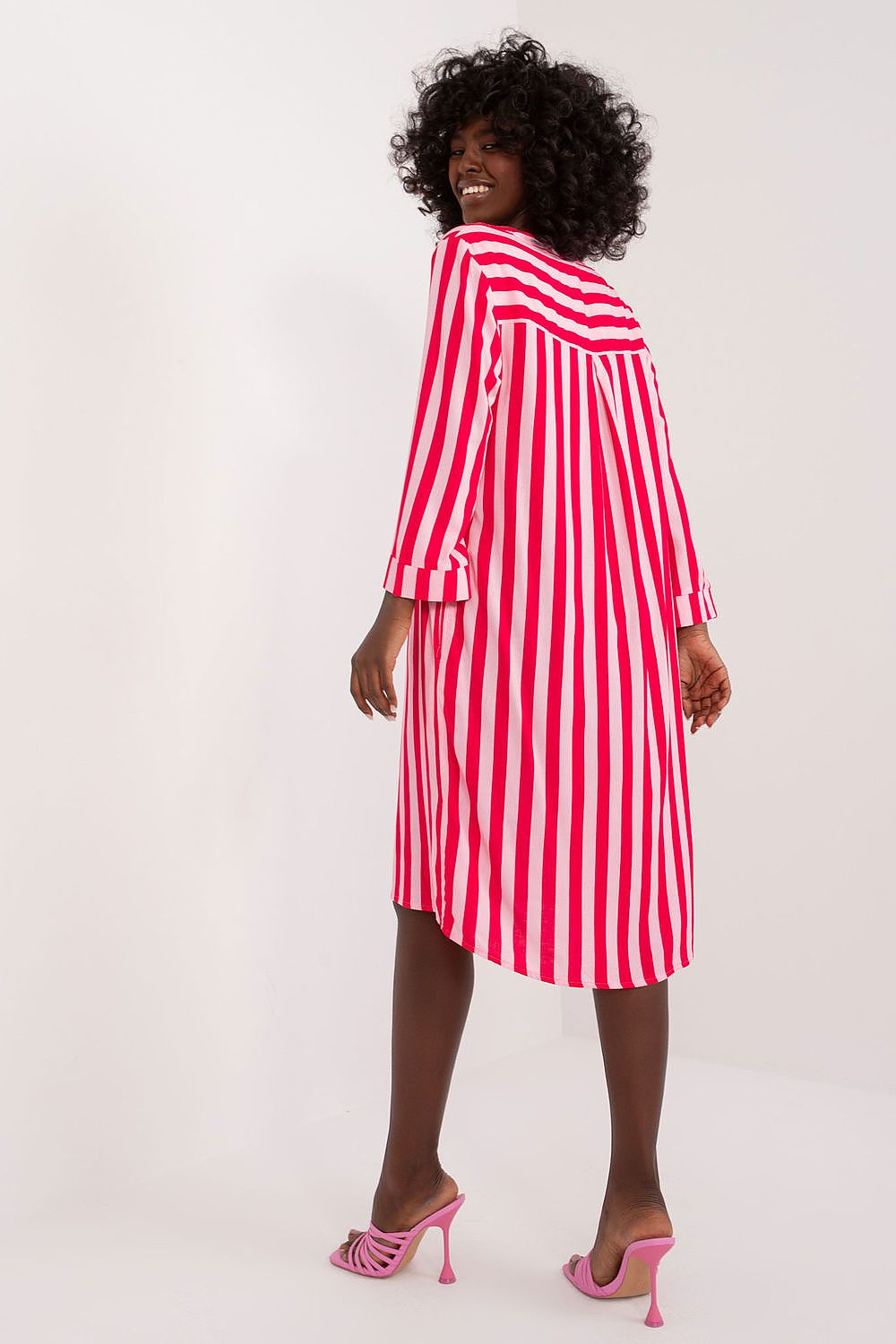 Chic V-neck Sublevel oversized dress displayed with its unique design, celebrating casual luxury and the comfort of breathable viscose fabric.
