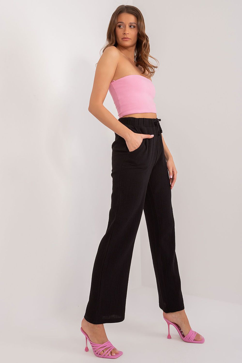 Luxury women's high waist cotton trousers by Sublevel, featuring elegant tie strings and practical slip pockets in a stylish design for a sophisticated look.