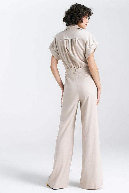 Stylish wide-leg jumpsuit from Nife, crafted from a comfortable viscose linen cotton blend, showcasing a classic collar and kimono sleeves for a chic look.
