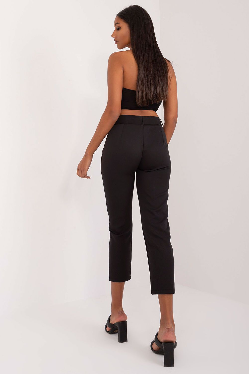 Elegant Och Bella high-waist chino trousers with practical slip pockets, a versatile addition to any luxury wardrobe.