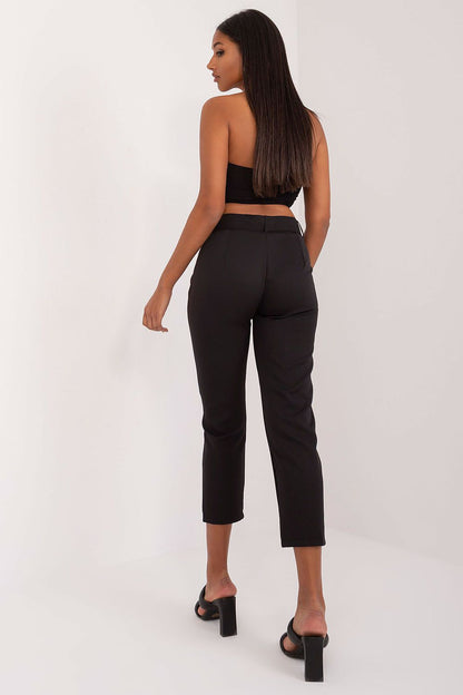 Elegant Och Bella high-waist chino trousers with practical slip pockets, a versatile addition to any luxury wardrobe.