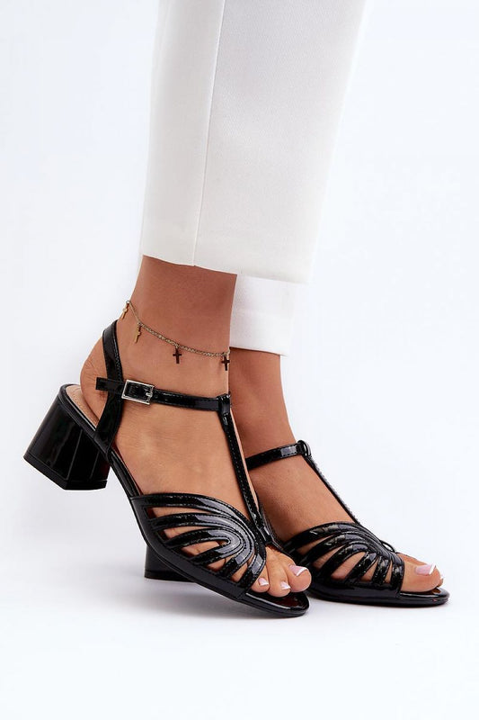 Elegant low block heel women's sandals by Step in Style, featuring an adjustable buckle and a comfortable leather footbed, perfect for sophisticated dressing and stylish occasions.