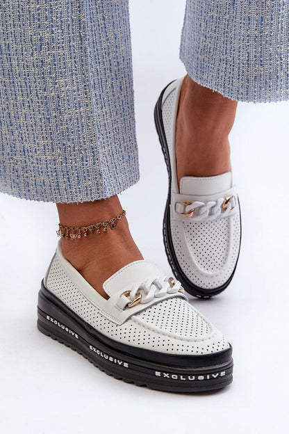 Step in Style's sophisticated women's loafers made of premium leather, complete with an eye-catching chain detail on a comfortable platform.