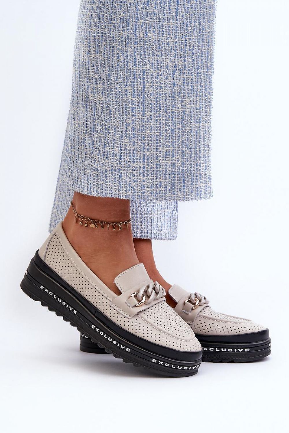 Luxury genuine leather women's loafers by Step in Style with exquisite chain detailing and a cushioned platform ensuring unmatched comfort.