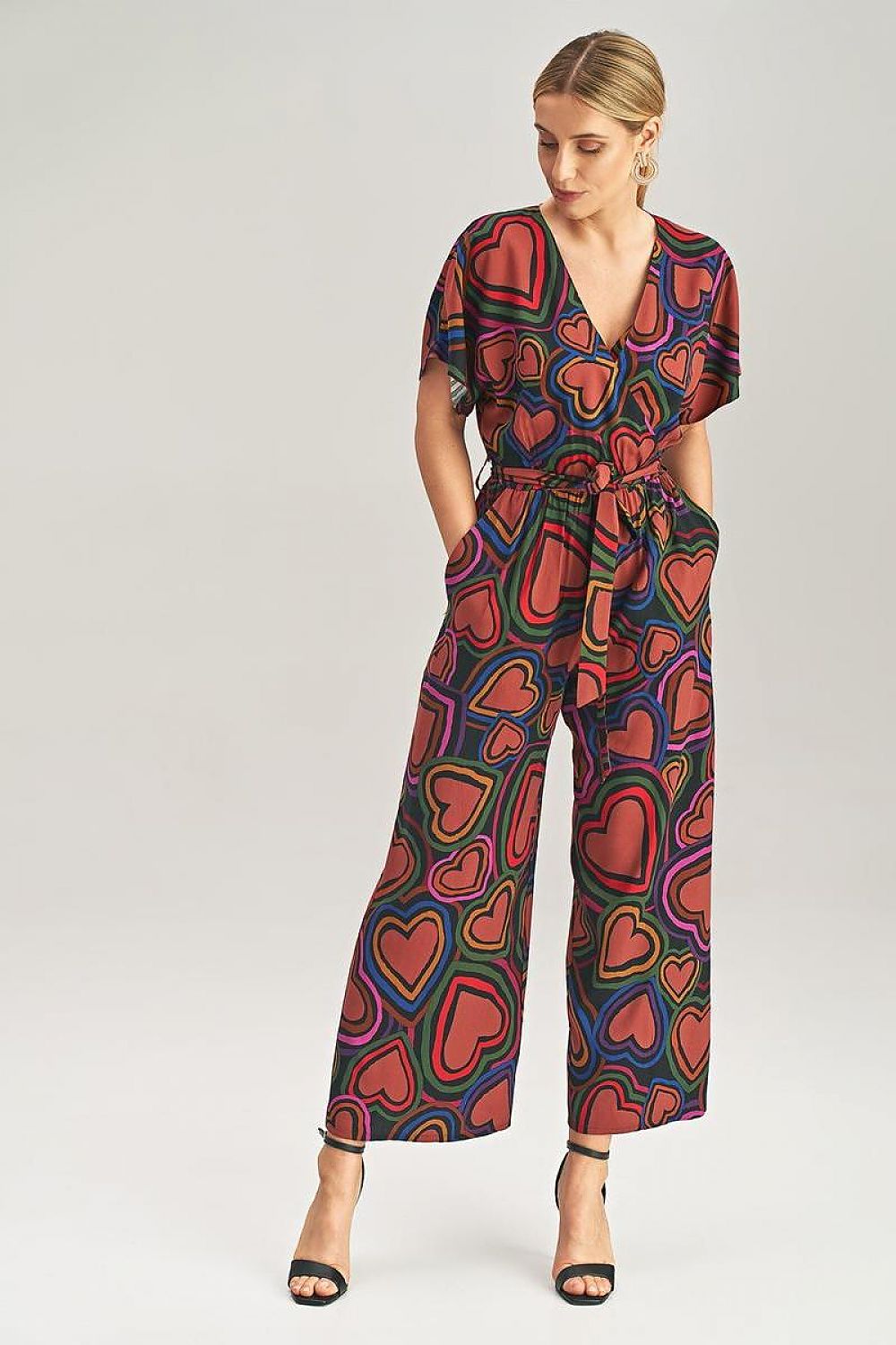 Upscale Figl loose jumpsuit showcasing a chic wrap front and dropped kimono-style sleeves, perfect for stylish comfort, made from 100% viscose.