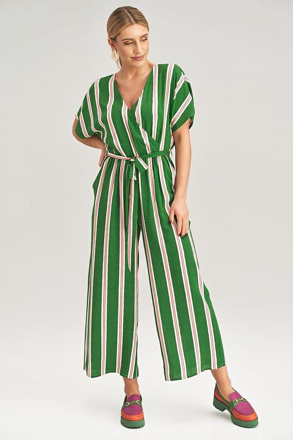 Stylish 7/8 wide leg Figl jumpsuit with a wrap front and snap closure, embodying modern luxury for women.