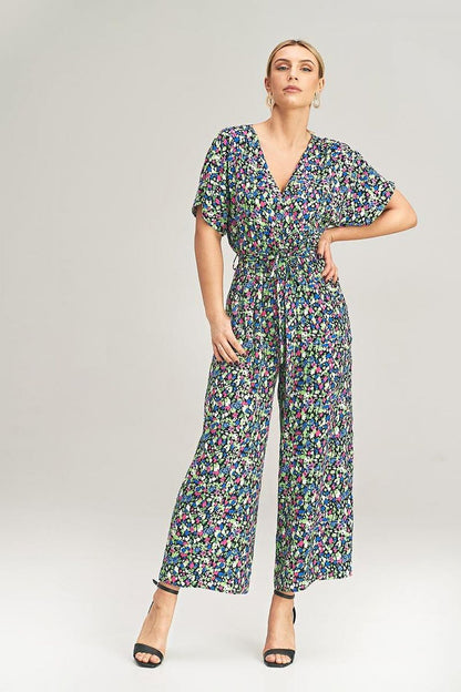 Sophisticated Figl jumpsuit with wide 7/8 legs and a beautiful wrap front, designed for comfort and style in soft viscose fabric.