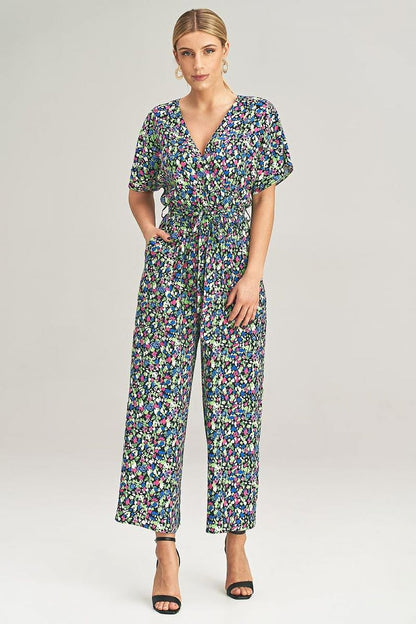Chic Figl loose jumpsuit adorned with kimono sleeves, tied at the waist, perfect for a luxurious and fashionable look.