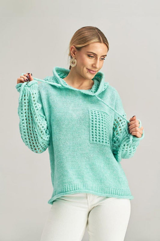 Elegant long-sleeved hooded jumper by Figl featuring a fashionable decorative pocket, perfect for a stylish winter look.
