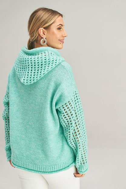 Luxurious long-sleeved hooded jumper by Figl featuring a stylish decorative pocket, perfect for an elegant look.