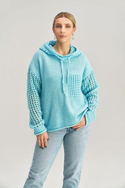 Chic Figl hooded jumper showcasing unique sleeve design and a decorative front pocket for a fashionable statement.