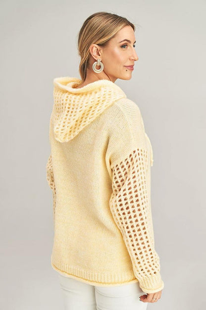Luxurious black jumper with hood by Figl, showcasing an elegant design and trendy neckline.