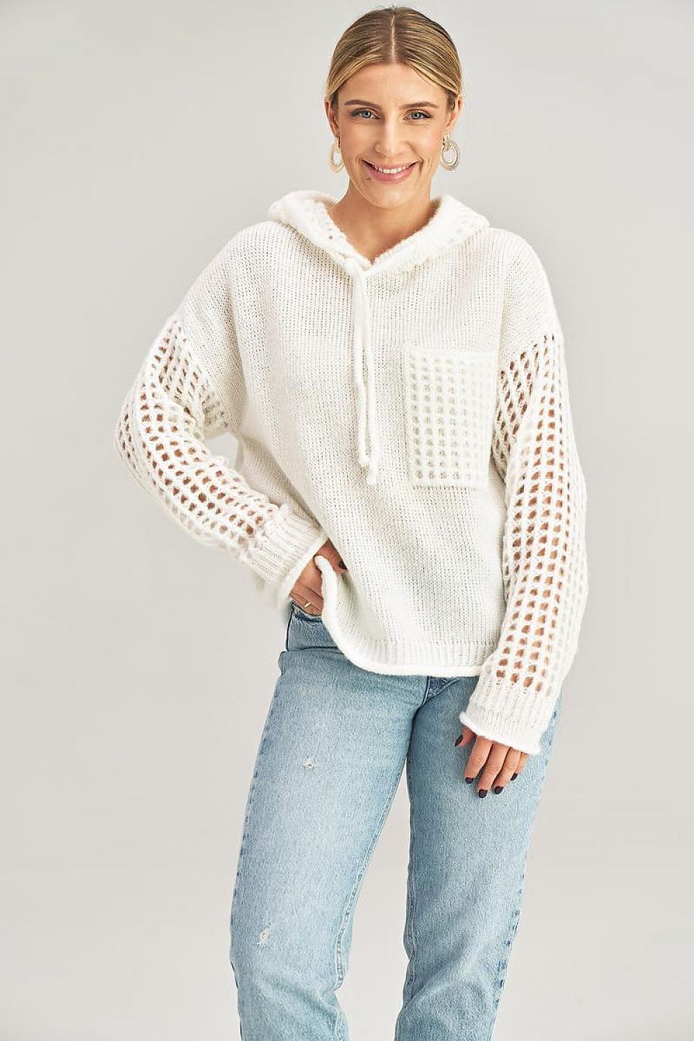 Fashionable long-sleeved sweater by Figl with a unique decorative pocket detail.
