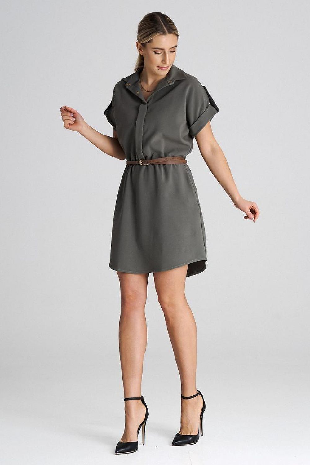 Close-up of Figl Daydress showcasing cuffed sleeves and a belted waist, ideal for a sophisticated look.