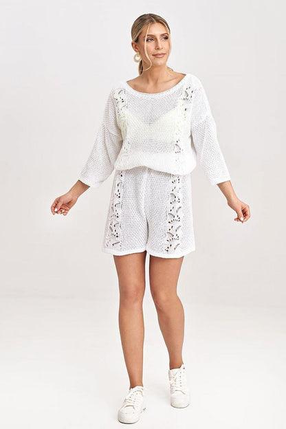 Elegant Figl two-piece blouse and shorts set featuring knitted inserts and openwork detailing, ideal for luxe summer occasions.