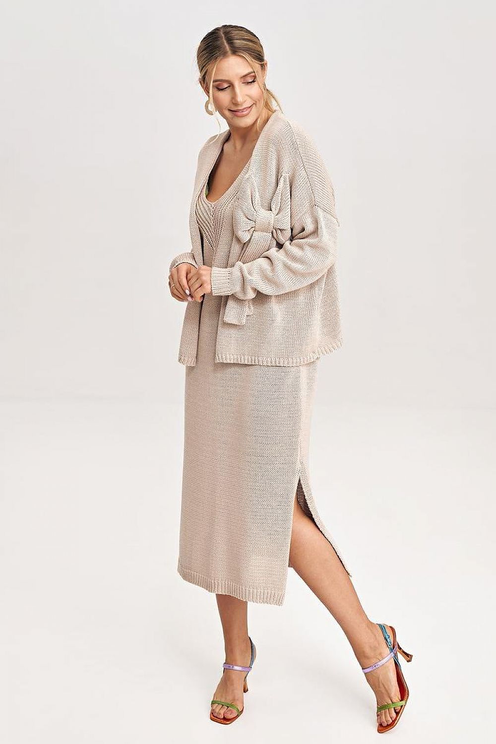 Elegant Figl two-piece midi dress set featuring a stylish bolero with bow detail and deep neckline, perfect for a luxurious evening out.