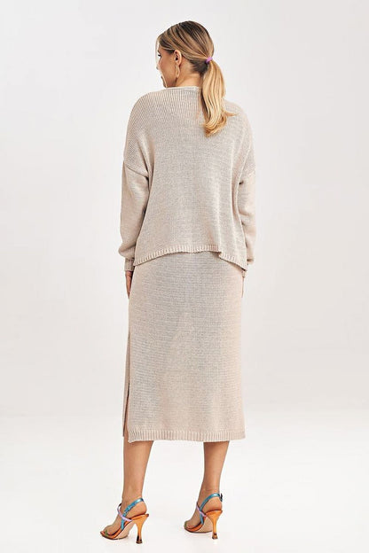 Full view of the Figl two-piece midi dress set styled for a chic look, highlighting the open front bolero and the dress's thick straps and deep neckline.