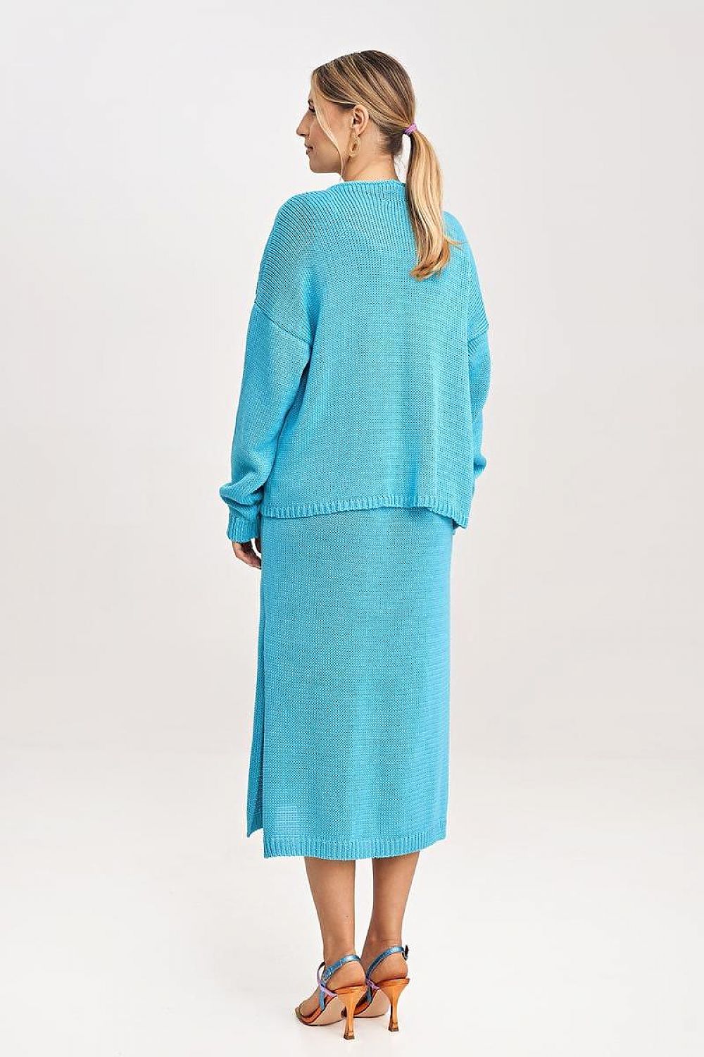 Fashion-forward Figl two-piece set with a detailed view of the dress and bolero combination in a chic aesthetic.