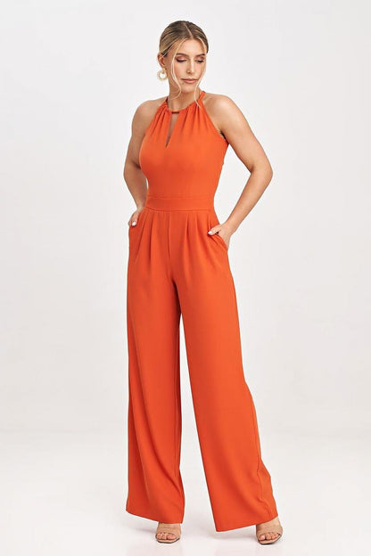 Elegant sleeveless jumpsuit by Figl featuring a tied neck and slip pockets, perfect for sophisticated occasions.