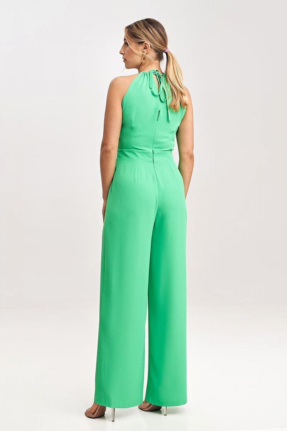 Wide-legged design of the Figl elegant jumpsuit, highlighting its fashionable back zip closure and tailored fit.