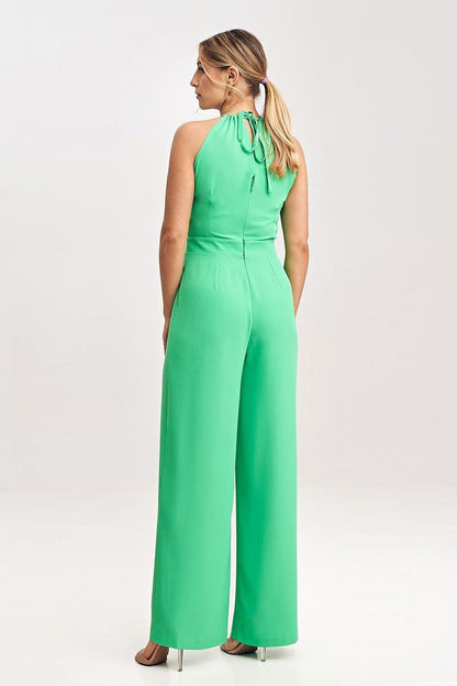 Wide-legged design of the Figl elegant jumpsuit, highlighting its fashionable back zip closure and tailored fit.