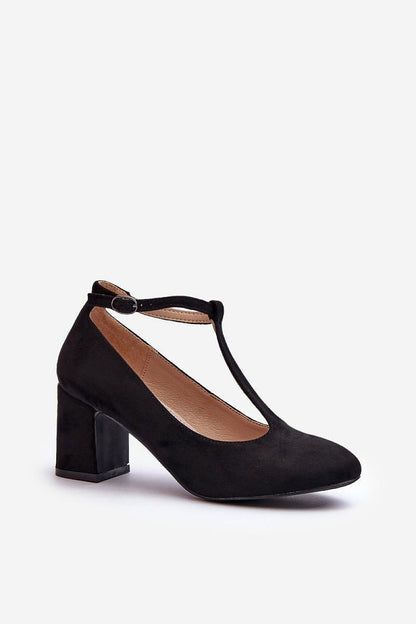 Stylish women's block heel pumps made from eco-suede by Step in Style, showcasing a chic design with rounded toes and an adjustable buckle strap for a custom fit.