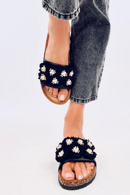 Close-up of Inello's exquisite women's sandals showcasing the luxurious eco-leather, floral embellishments, and shimmering rhinestones.