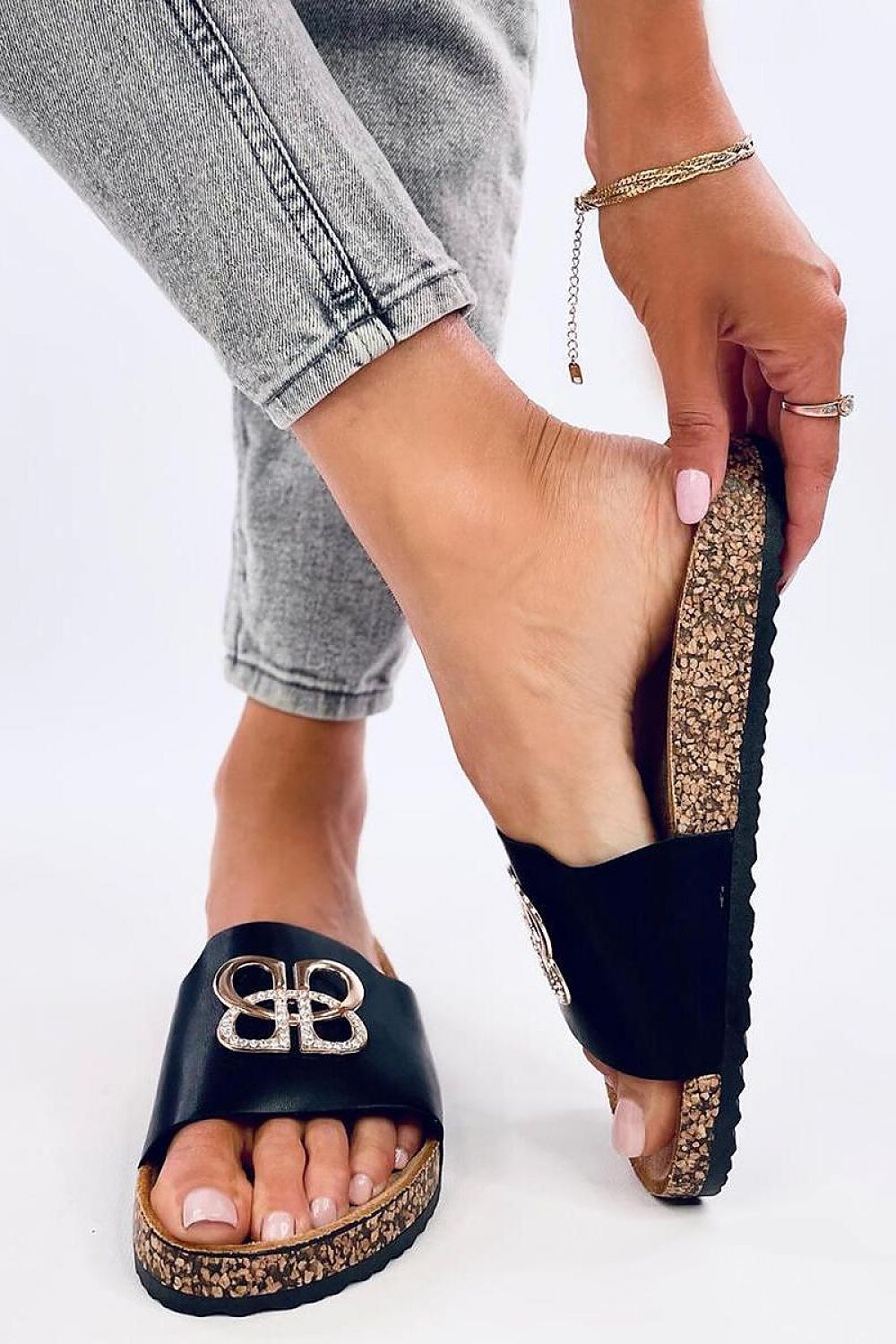 Close-up of Inello Women's Luxury Patent Slides showcasing intricate rhinestone detailing on eco leather, ideal for adding a touch of luxury to casual outfits.