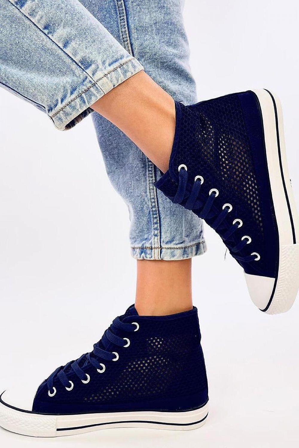 Inello Women's High-Top Sneakers showcasing unique lace-up design, crafted from breathable fabric for superior comfort and style in a luxurious presentation.