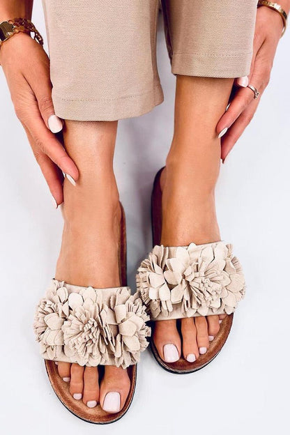 Elegant women's flip-flops by Inello crafted from sustainable suede with a cork insole, adorned with a beautiful floral design for stylish summer wear.