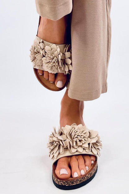 Luxury women's eco-friendly suede slides by Inello featuring a stylish floral detail and cork insole, perfect for summer comfort.