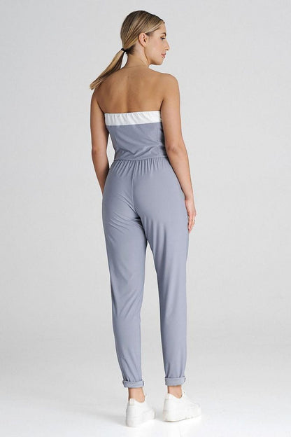 Model wearing the Figl strapless jumpsuit, exuding luxury and sophistication with its flattering fit and contemporary design.