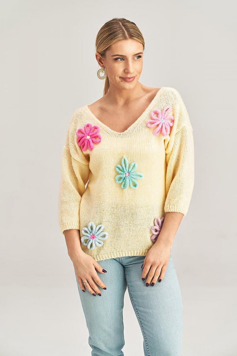 Luxury Figl Floral Detail V-Neck Sweater elegantly designed with floral embellishments and 3/4 sleeves, crafted from a soft blend of acrylic, nylon, polyester, and wool.