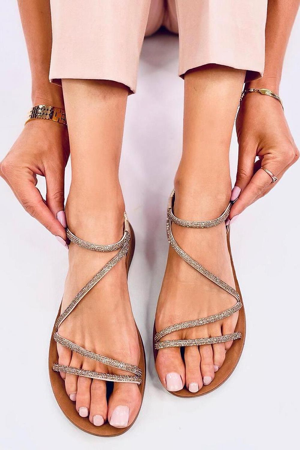 Stylish Inello sandals with lightweight design and embellished zirconia detailing, perfect for chic summer outfits.