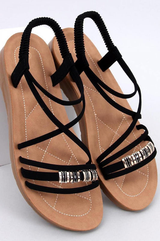 Elegant women's sandals by Inello featuring a subtle 2.5cm heel, luxurious gold details, and stylish crisscross straps, perfect for sophisticated summer styles.